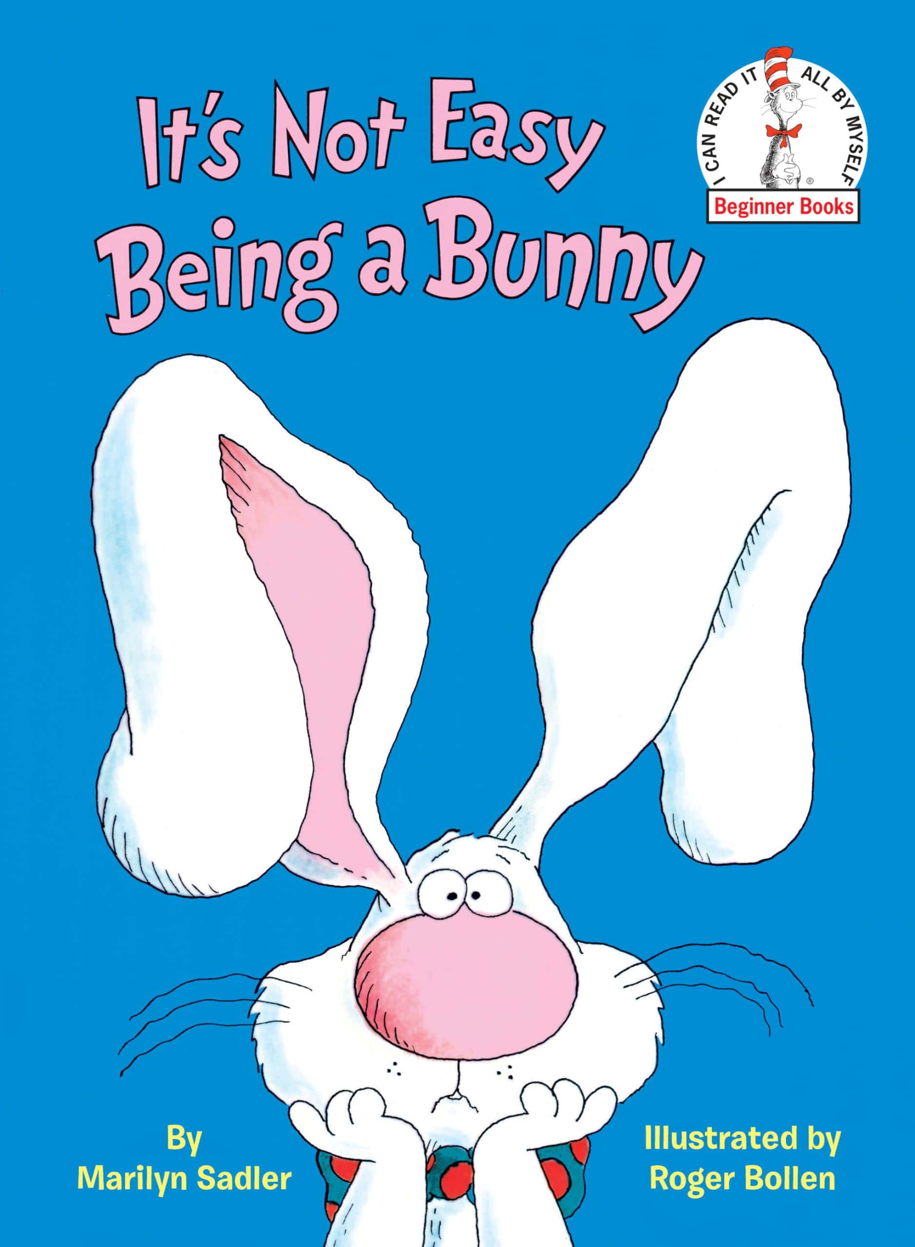 Book cover of *It's Not Easy Being a Bunny* by Marilyn Sadler, illustrated by Roger Bollen. The cover features a cartoon bunny with large floppy ears, a pink nose, and a frustrated expression against a bright blue background. The *Beginner Books* logo with the Cat in the Hat is displayed in the top right corner.