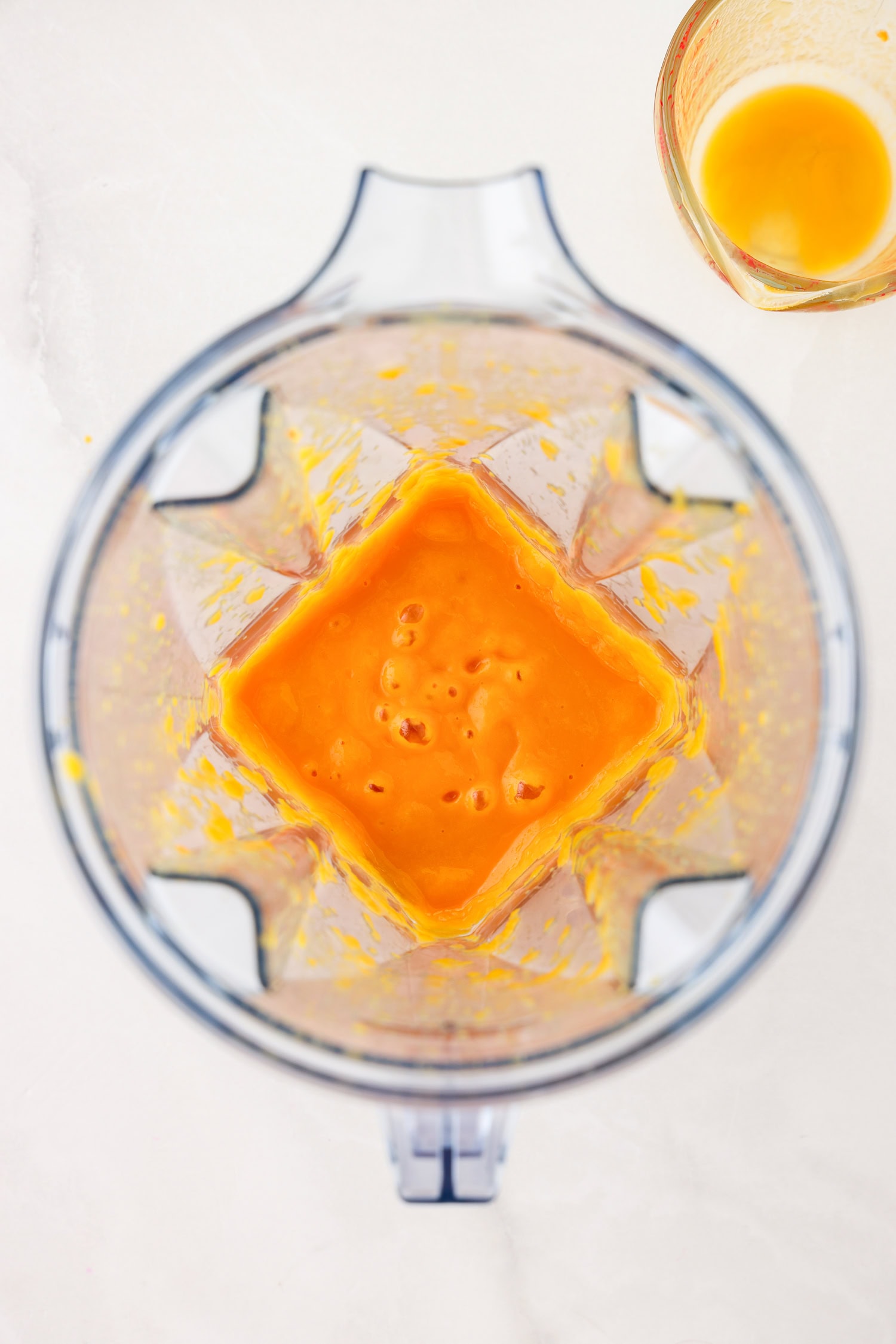 Orange fruit mixture blended.