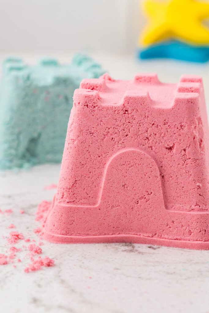 Colorful children's sandcastle mold for indoor play and fun kids activities.