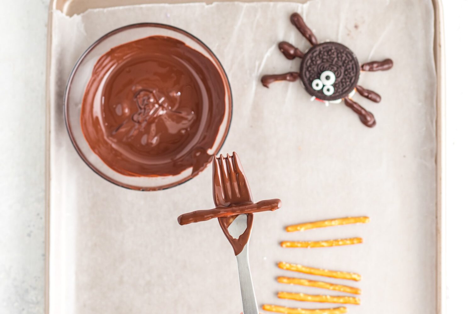 Fork with chocolate dipped pretzel rod