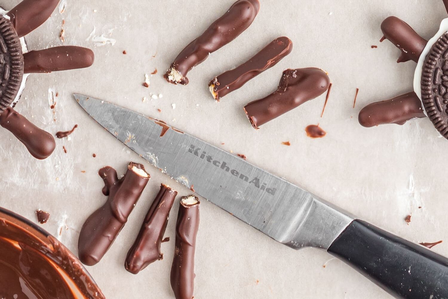 Chocolate dipped pretzel sticks cut in half