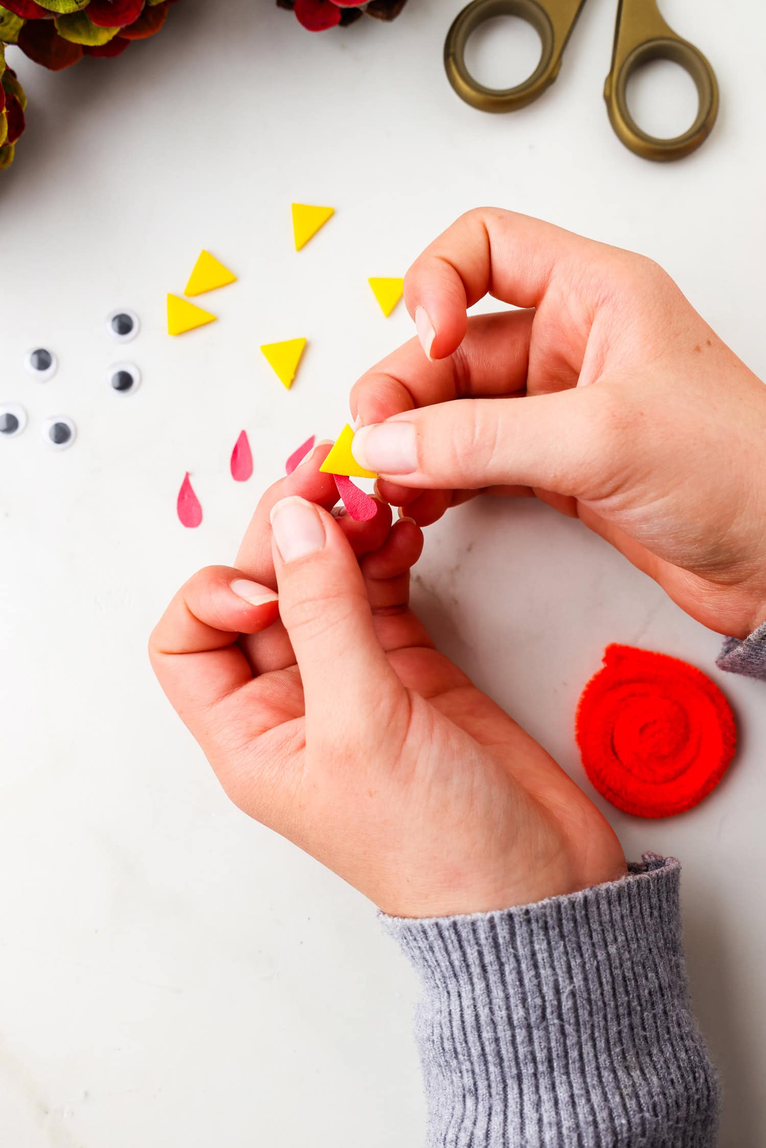 Picture of beak and gobbler being glued together.