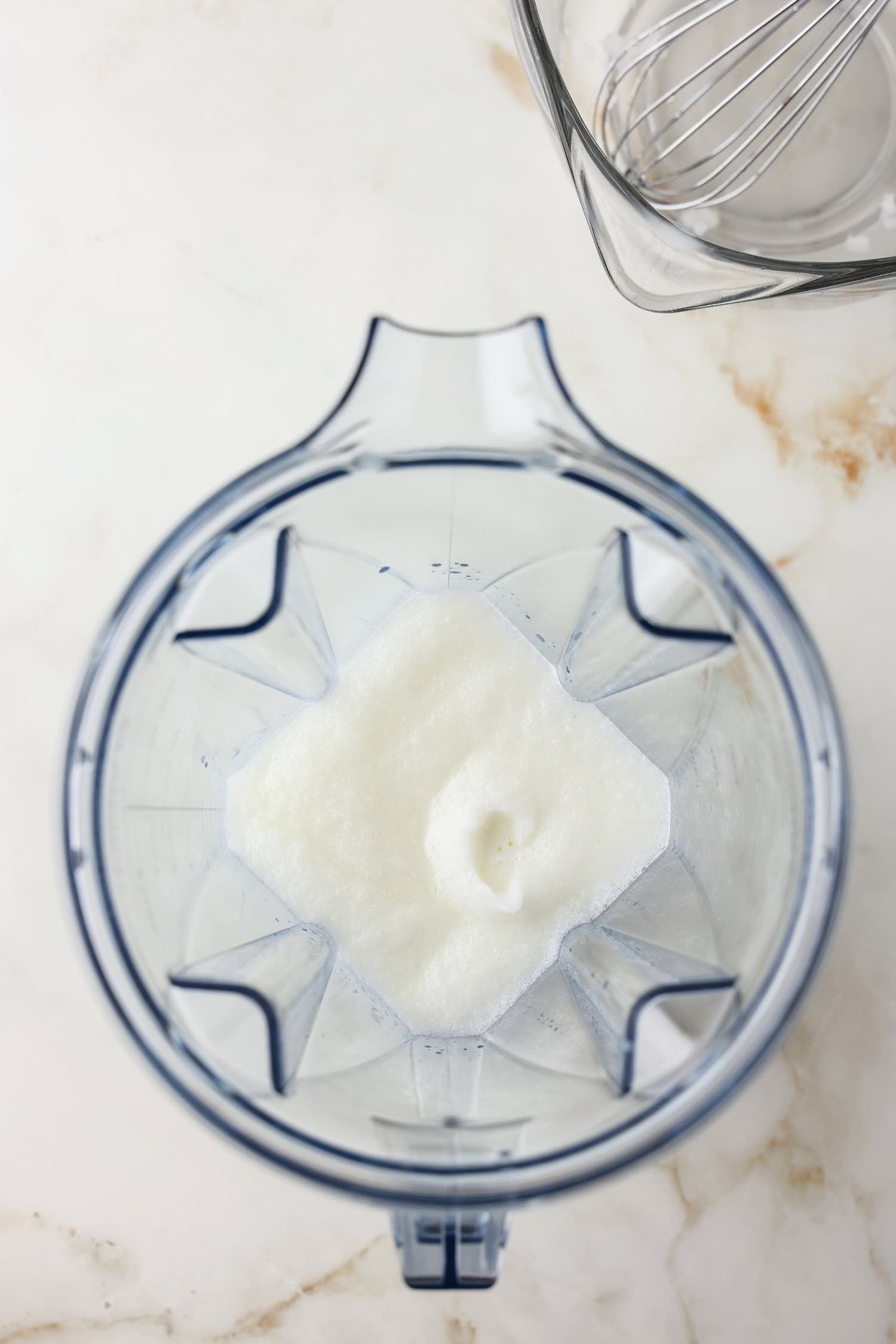 Overhead picture of snow ice cream being blended.